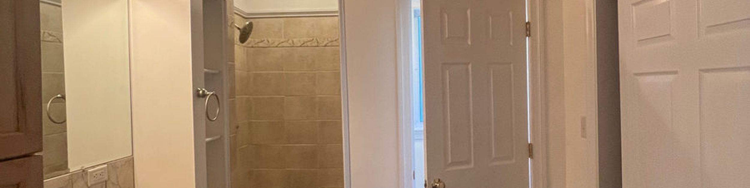 Bathroom with vanity and tiled floor