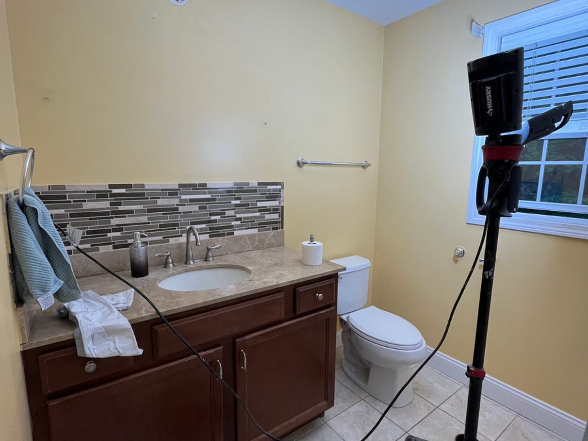 Bathroom walls and vanity before painting, comparison 4