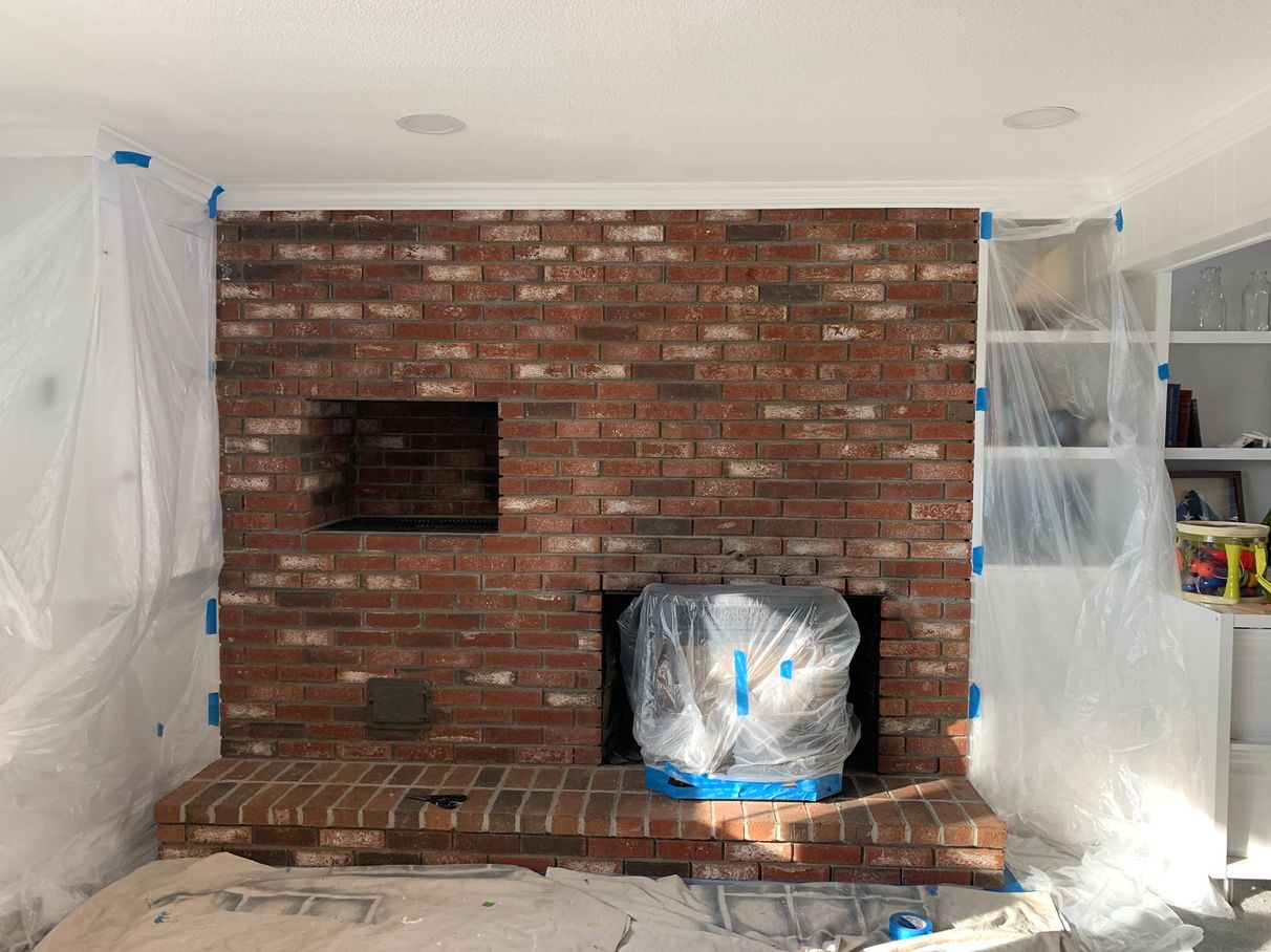 Fireplace and surrounding brick before painting, comparison 8