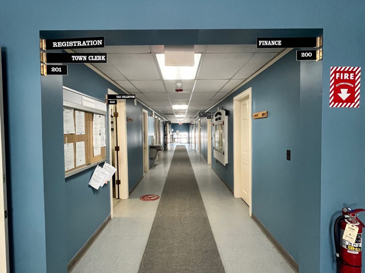 Commercial hallway with blue painted walls