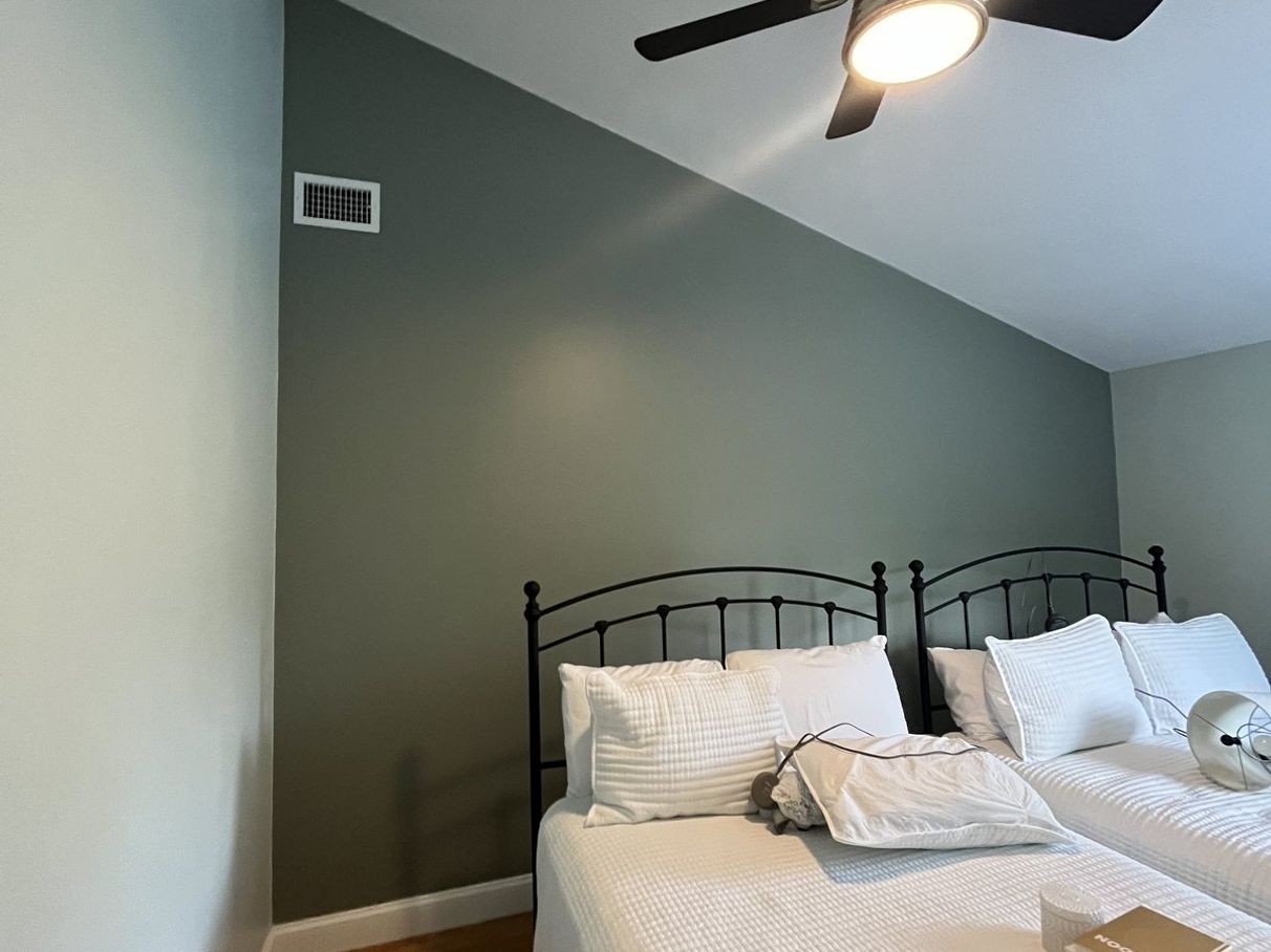 Bedroom with fresh gray interior paint
