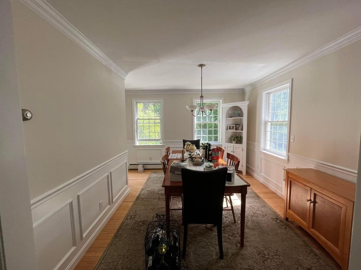 Dining room with painted walls and trim