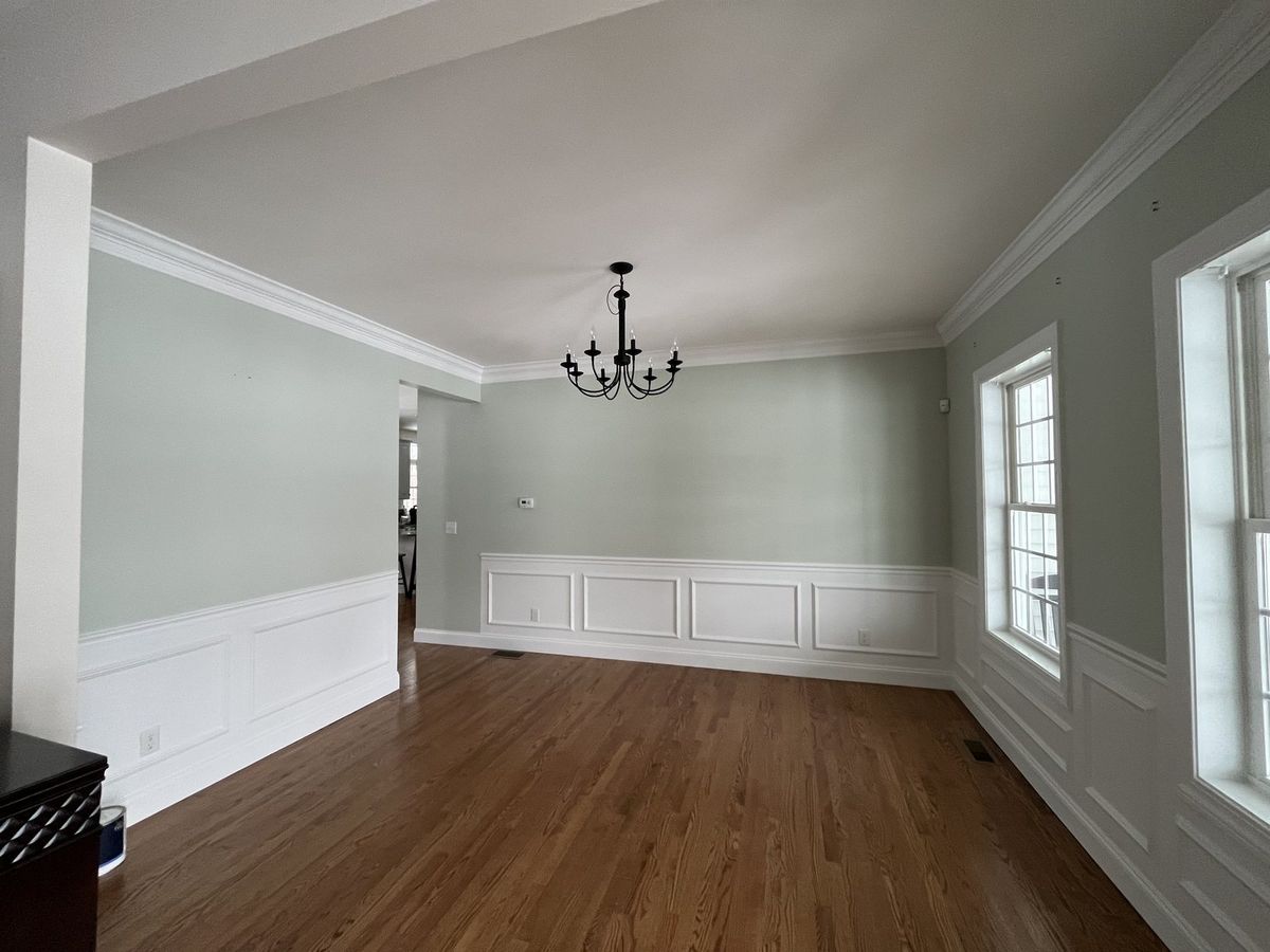 Bright dining room with fresh interior paint and trim